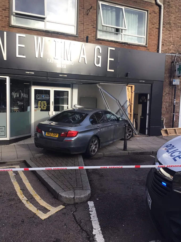 BMW crashes into shop front of Wisbech tattoo store