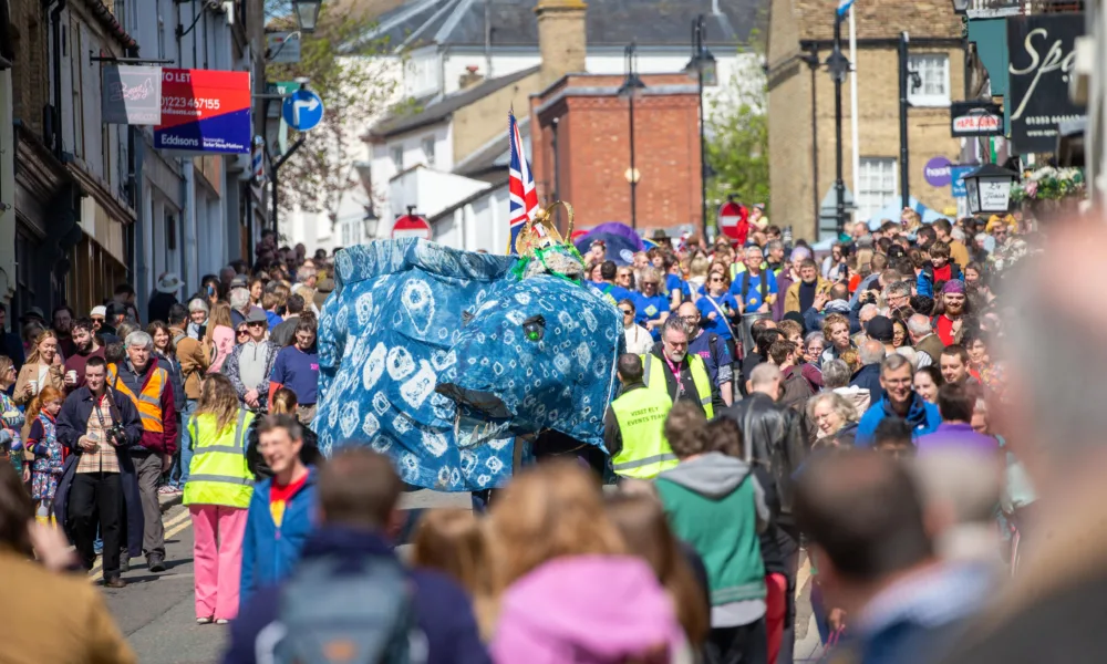 Dubbed ‘Coronation Eel Day’ the spectacular eel focal point snaked its way from Cross Green through the streets to Jubilee Gardens to begin a packed day of events by the river. Picture: TERRY HARRIS