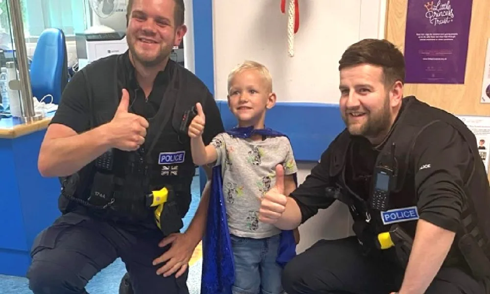 Police surprise Max as he is discharged from Addenbrooke’s Hospital after life saving treatment for cancer.