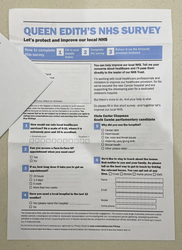 Chris Carter-Chapman, who is standing as the Conservative parliamentary candidate for South Cambs, posted on Facebook three days ago: “Great to be out in Queen Edith’s tonight despite the rain!” The N HS ‘survey’ is on the right. 