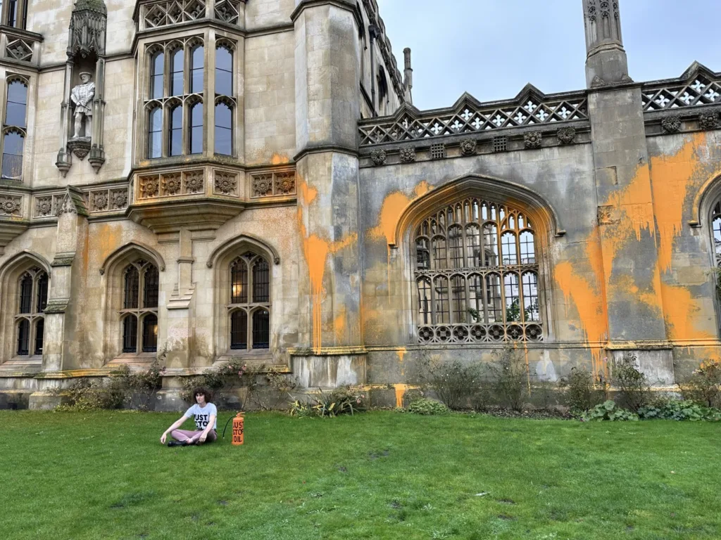 Orange paint sprayed over King’s College gatehouse, Cambridge, in Just Stop Oil protest