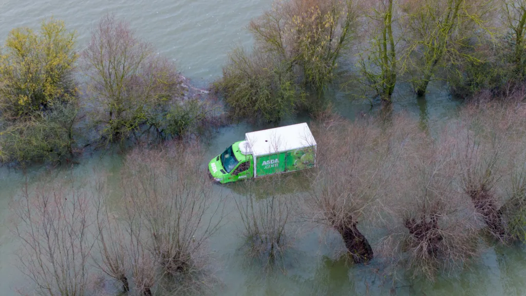 Morning after the night before: The Asda delivery van submerged in water midway through the Welney Wash Road on the A1101 bordering Cambridgeshire and Norfolk. PHOTO: Bav Media 