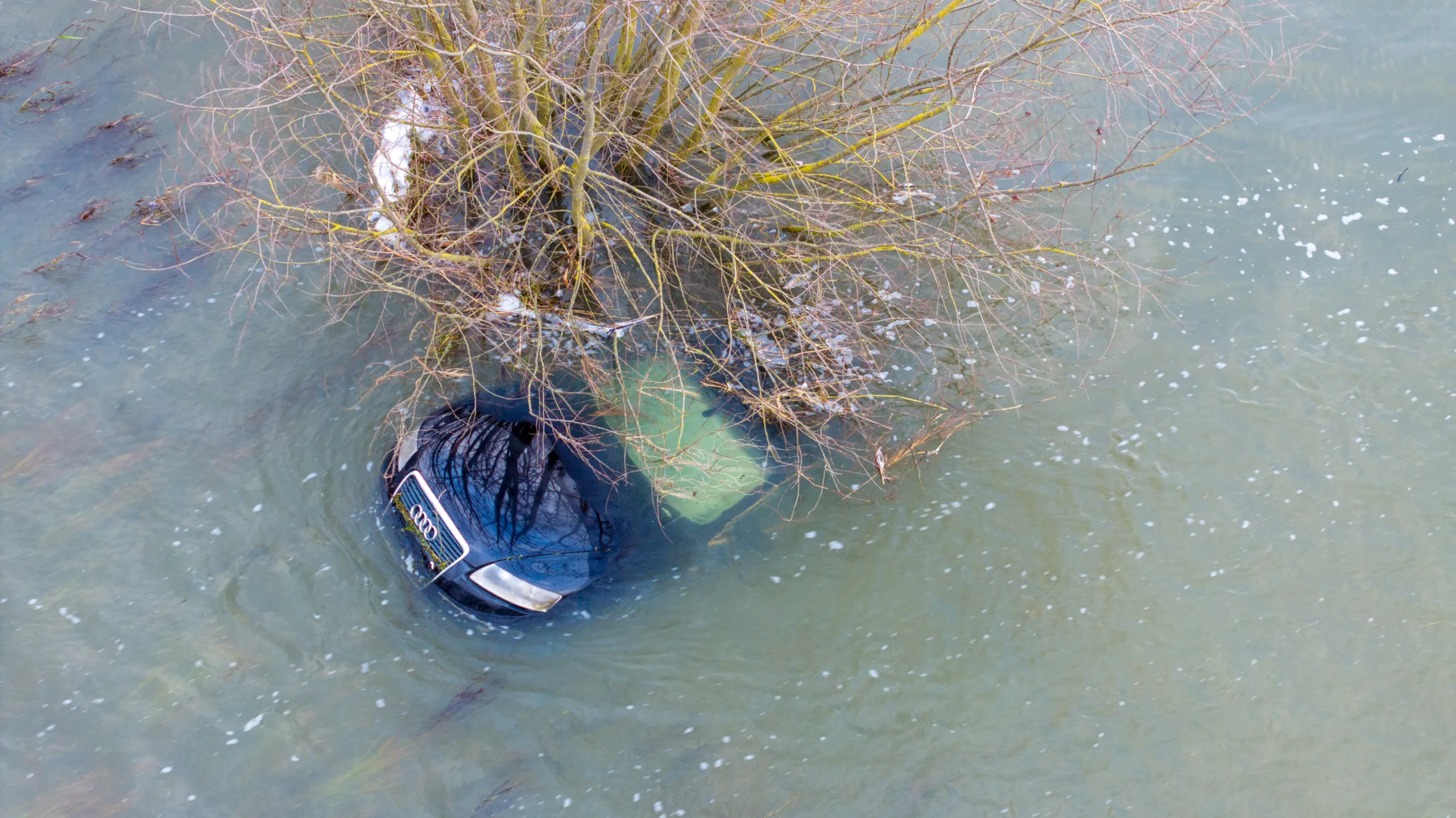 Picture dated December 20th shows an Audi car submerged on the flooded A1101 in Welney; one of two cars spotted floating in the waters. PHOTO: Bav Media