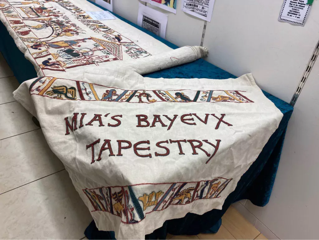 Mia Hanson took part of her Bayeux Tapestry to Wisbech Corn Exchange Conservation Trust's exhibition hall on Saturday: she was able to display almost 16 metres of tapestry. The walls were lined with photos and information about The Corn Exchange. 