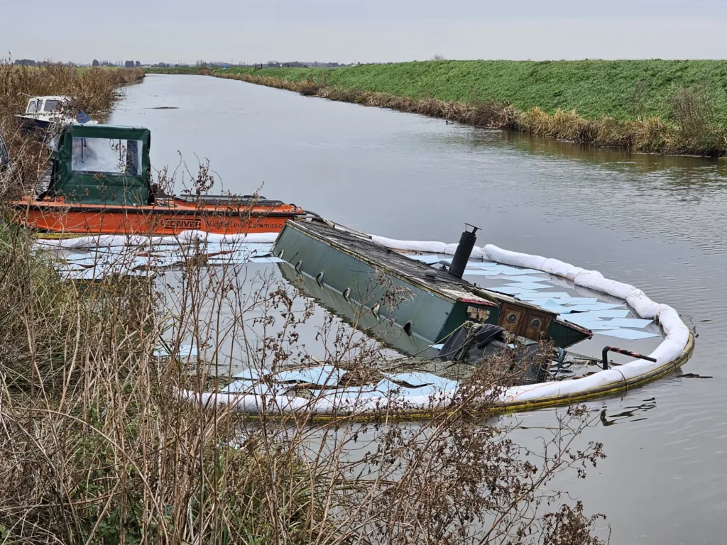 The boat that came adrift from its unofficial mooring on the river at March