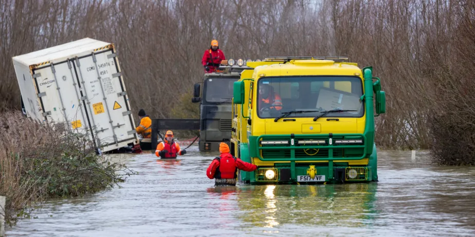 An articulated lorry was finally recovered from a flooded A1101 at Welney in Norfolk today (Thurs) after being stuck in the deep water for four days. PHOTO: Bav Media