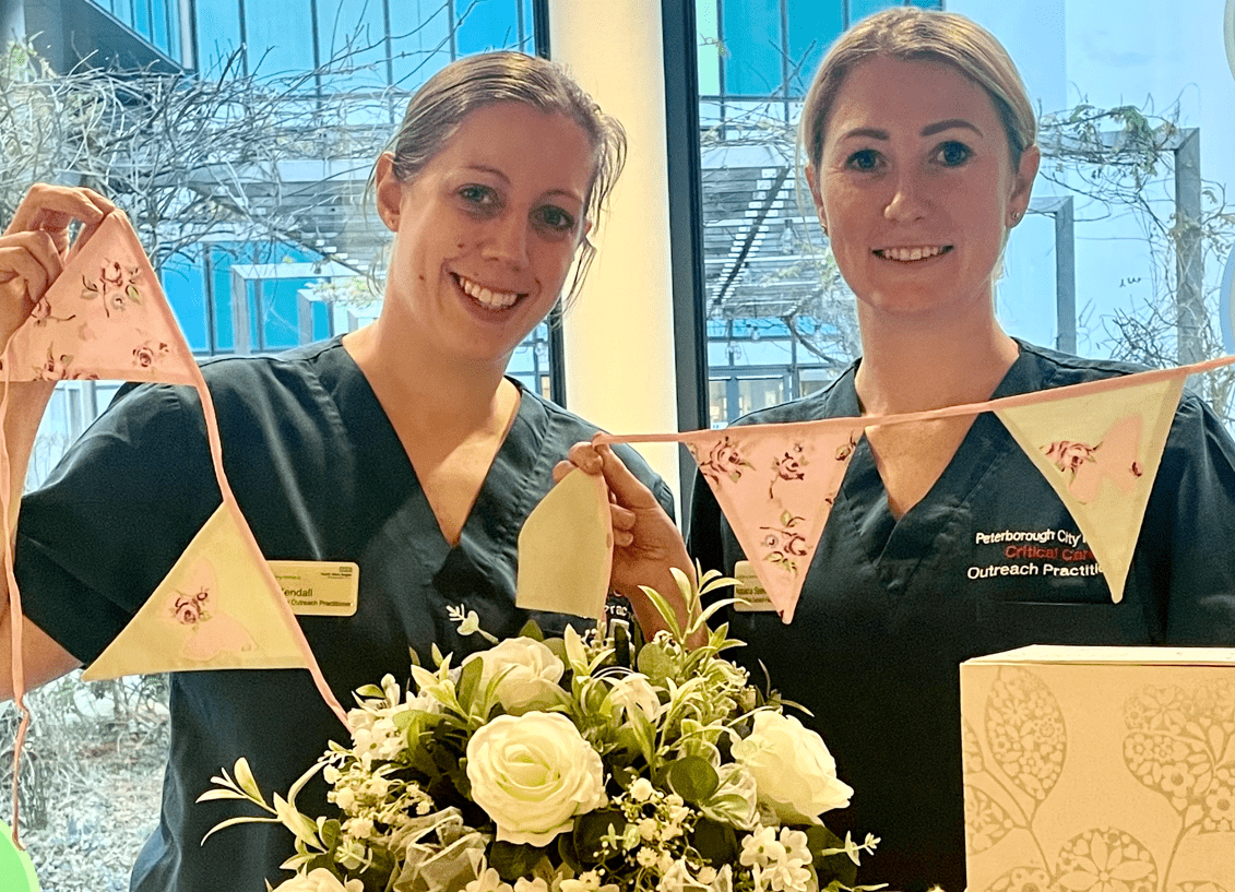 Critical Outreach Nurse Practitioners Lois Kendall and Natasha Steels-Webb with some of the Wedding Box items.