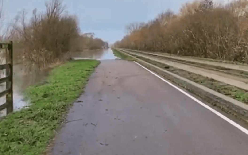 Photos from Cambridgeshire County Council show the maintenance track of the guided busway flooded between Swavesey and St Ives