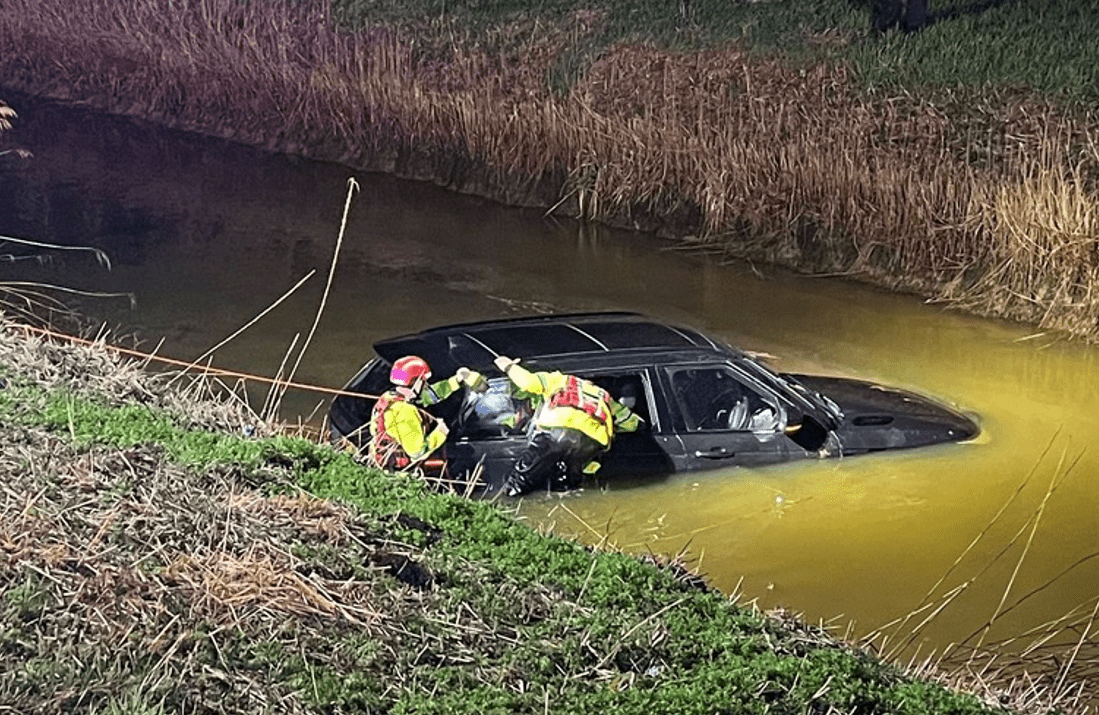 Emergency workers establish the car in the river at Prickwillow had no occupants