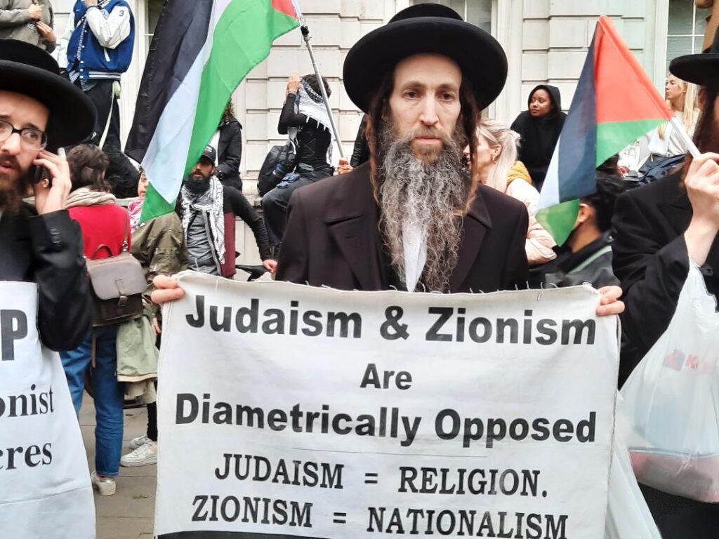 ‘We were a very mixed crowd on the Gaza demonstration. The strongest condemnation came from Hasidic Jews’ says ANGELA SPRINGER who attended Tuesday’s demonstration in London outside the gates of Downing Street