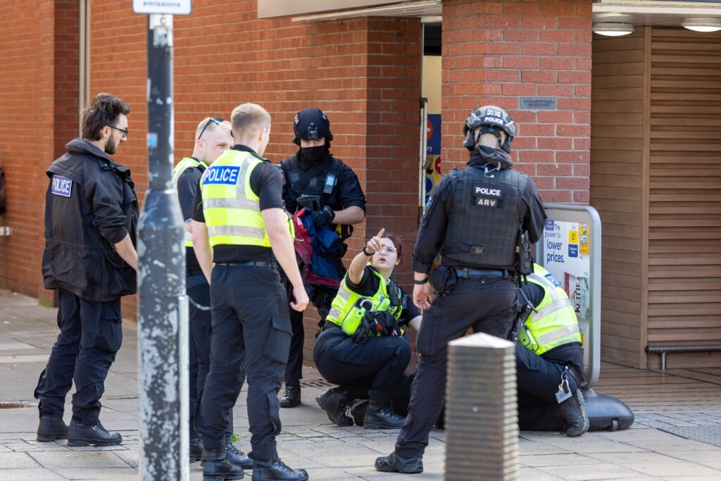 Armed police out in Peterborough today and gave chase prior to arrest in Broadway. PHOTO: Terry Harris 