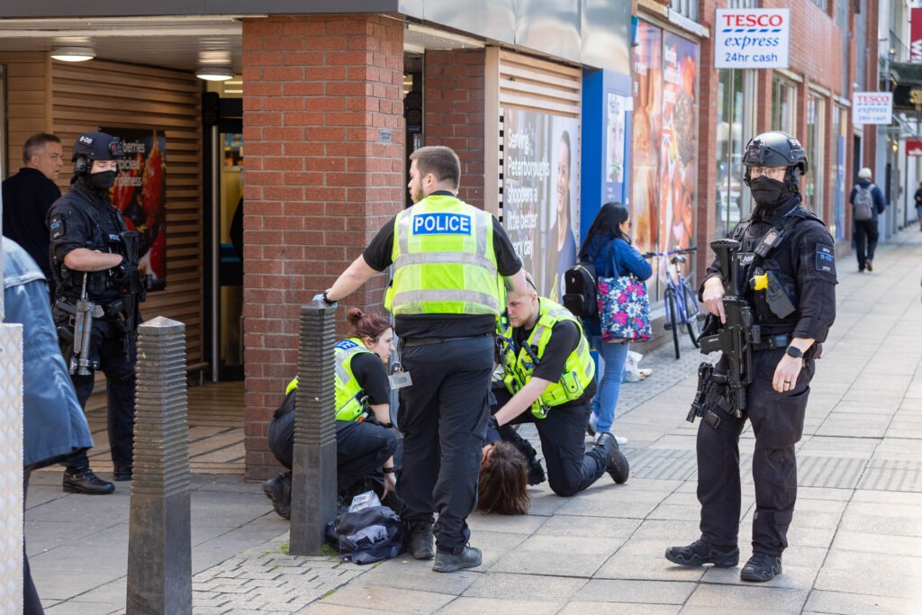 Armed police out in Peterborough today and gave chase prior to arrest in Broadway. PHOTO: Terry Harris 