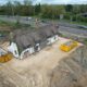 Historic Brook Cottages near the Black Cat roundabout just prior to demolition: PHOTO Drone Photos Sandy
