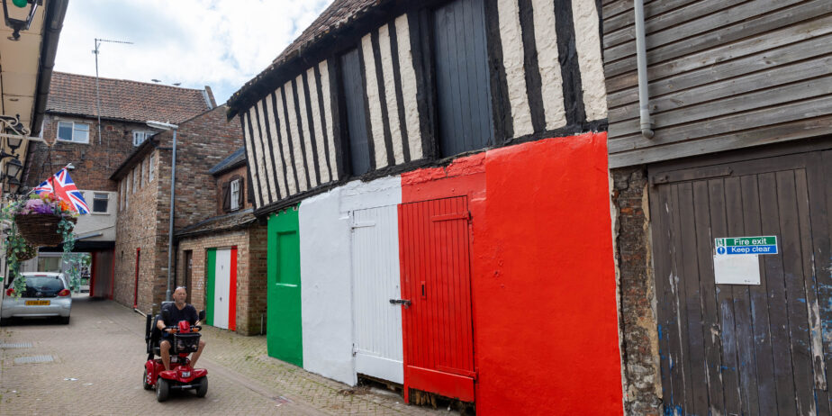 News for Peterborough and Cambridgeshire - Wisbech town councillor Shahid Rafique facing an outcry after he painted a 15th century listed building red, white and green – to match the colours of his Italian Affairs restaurant