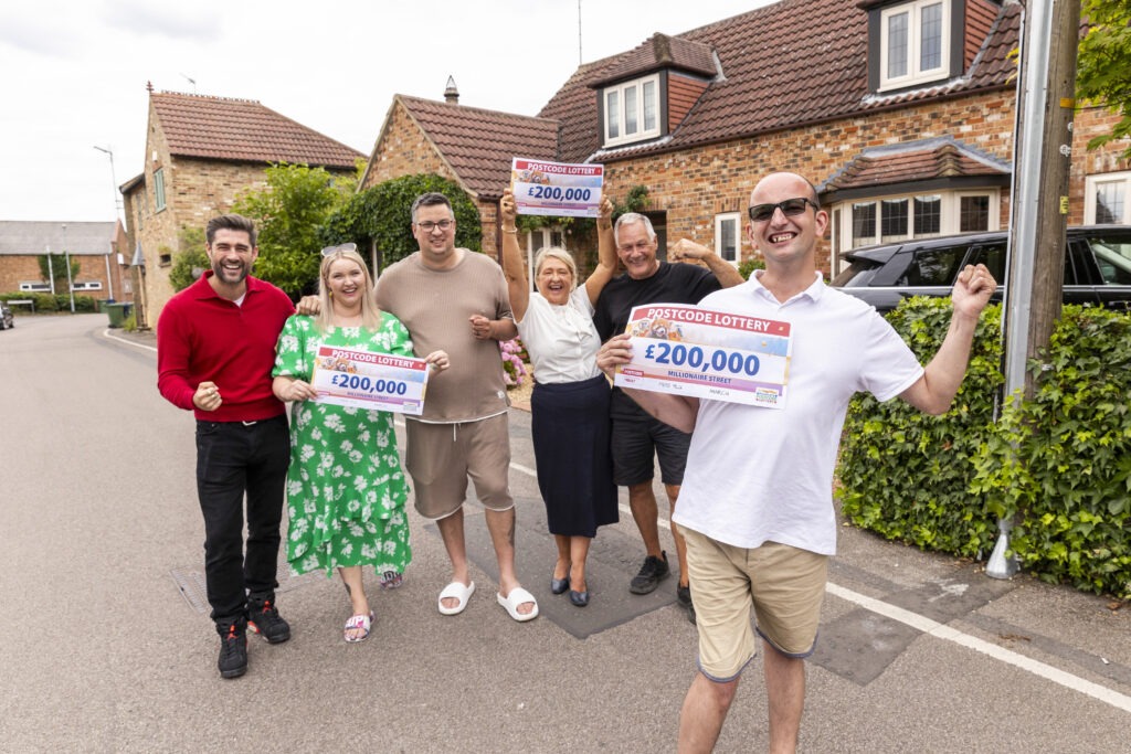 Neighbours celebrate Postcode Lottery win