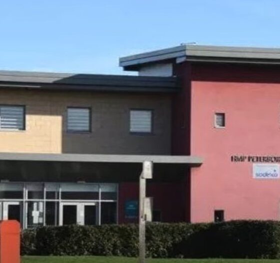A man has been charged in connection with the death of a man at HMP Peterborough.
