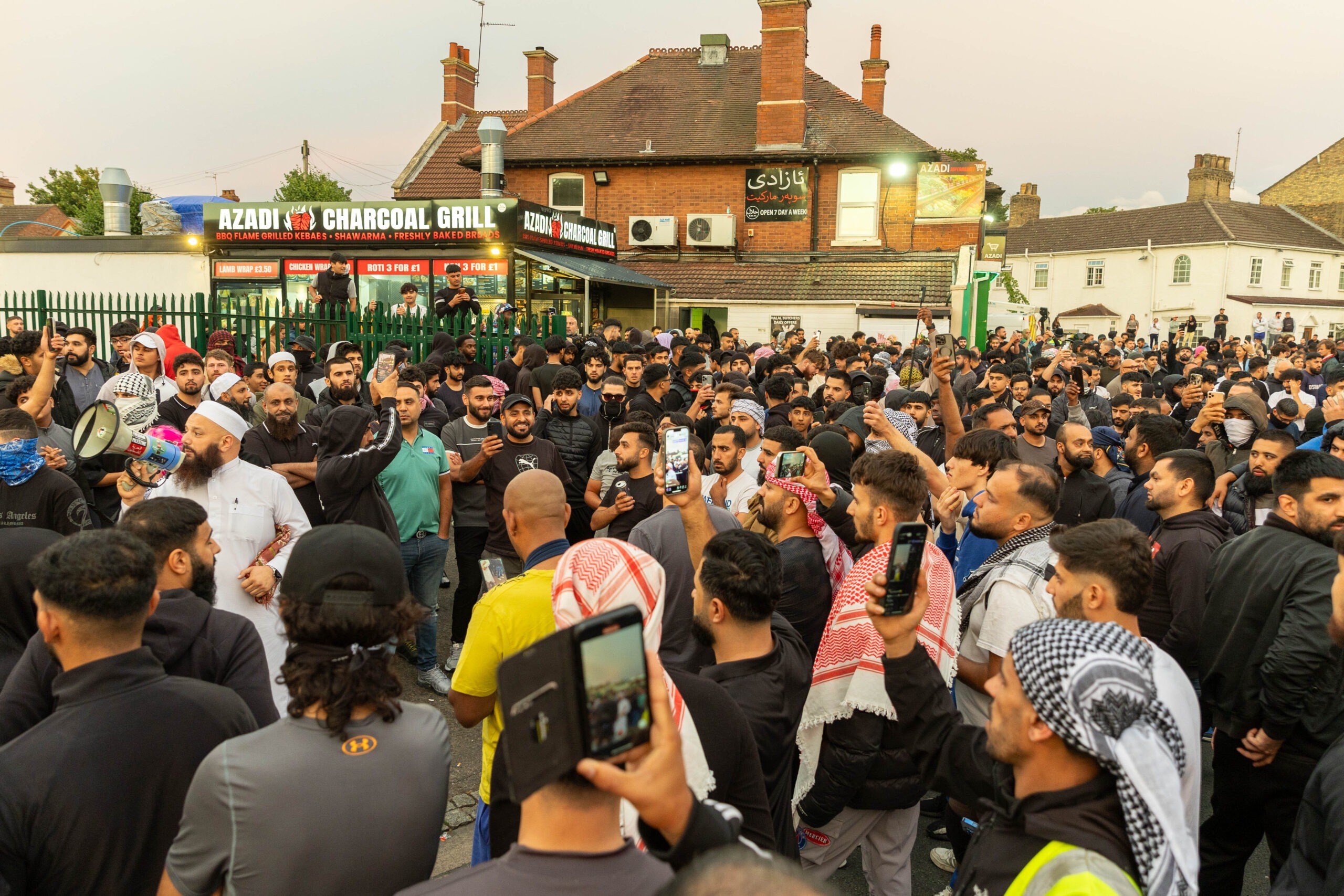 ‘Peterborough riots are so peaceful it’s just showing y’all what’s community spirit,’ wrote one man. Counter protestors congregate on Lincoln Road following social media threats to burn a local immigration centre. Millfield, Peterborough Wednesday 07 August 2024. PHOTO: Terry Harris.