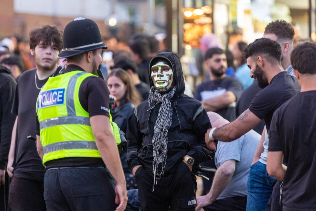 ‘Peterborough riots are so peaceful it’s just showing y’all what’s community spirit,’ wrote one man. Counter protestors congregate on Lincoln Road following social media threats to burn a local immigration centre. Millfield, Peterborough Wednesday 07 August 2024. PHOTO: Terry Harris.