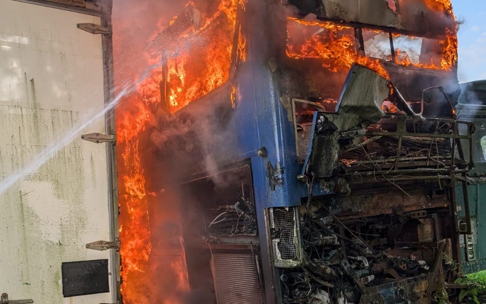 The fire broke out last night just before 6.30pm at Young’s Coaches at Lode Way, Haddenham, and destroyed at least one bus and an artic trailer.