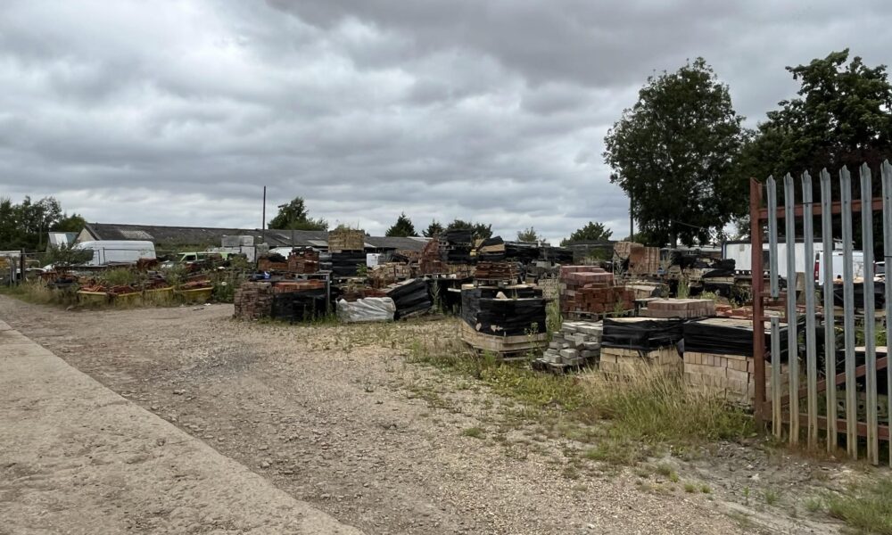 Housing planned for Brownlows Yard in Creek Road, March: within the brownfield land, there are commercial buildings and land being used for the storage of commercial and building materials, vehicles, and a caravan. PHOTO: John Elworthy