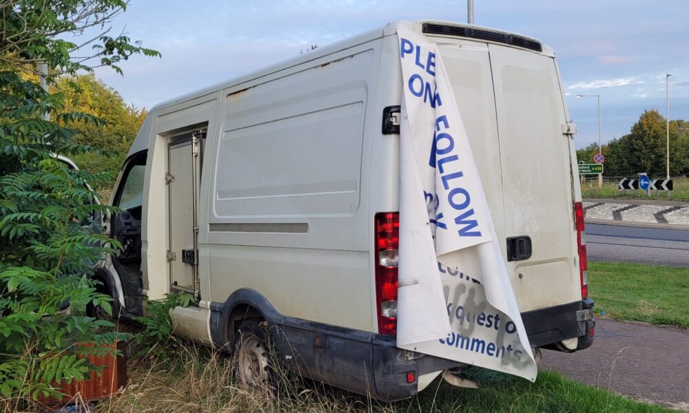 The owner of an abandoned white van, which was spray painted with offensive graffiti, has been fined £1,894 at Cambridge Magistrates Court