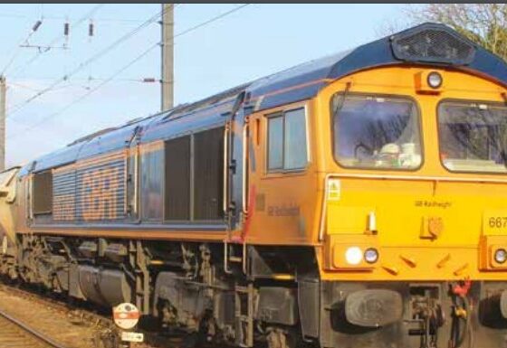 This train conveys sand for glass making from the quarry at Middleton Towers, near Kings Lynn, to Goole in Yorkshire. It is on its way to Ely where it has to negotiate the single lead junction