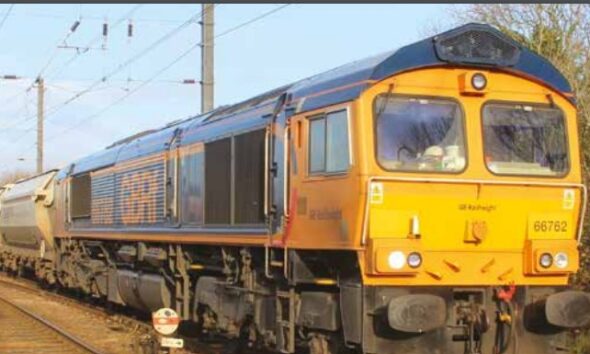 This train conveys sand for glass making from the quarry at Middleton Towers, near Kings Lynn, to Goole in Yorkshire. It is on its way to Ely where it has to negotiate the single lead junction