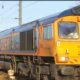 This train conveys sand for glass making from the quarry at Middleton Towers, near Kings Lynn, to Goole in Yorkshire. It is on its way to Ely where it has to negotiate the single lead junction