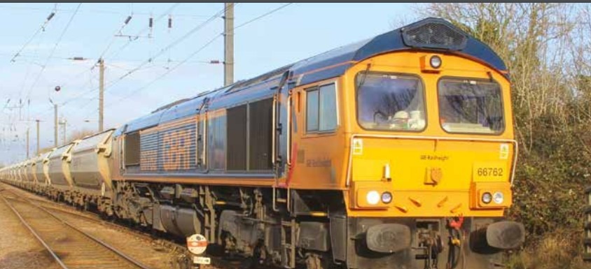 This train conveys sand for glass making from the quarry at Middleton Towers, near Kings Lynn, to Goole in Yorkshire. It is on its way to Ely where it has to negotiate the single lead junction