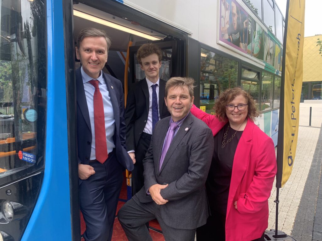 On the buses in Peterborough: From left: Peterborough MP Andrew Pakes, NW Cambs MP Sam Carling, Mayor Dr Nik Johnson and Cllr Anna Smith, deputy mayor