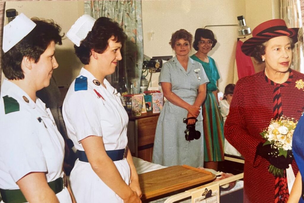 Long-serving nurse Mary Donaldson has retired after 41 years full-time service at North West Anglia NHS Foundation Trust. Pictured with the late Queen and Prince Philip at the former Edith Cavell Hospital in 1998