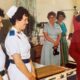 Long-serving nurse Mary Donaldson has retired after 41 years full-time service at North West Anglia NHS Foundation Trust. Pictured with the late Queen and Prince Philip at the former Edith Cavell Hospital in 1998