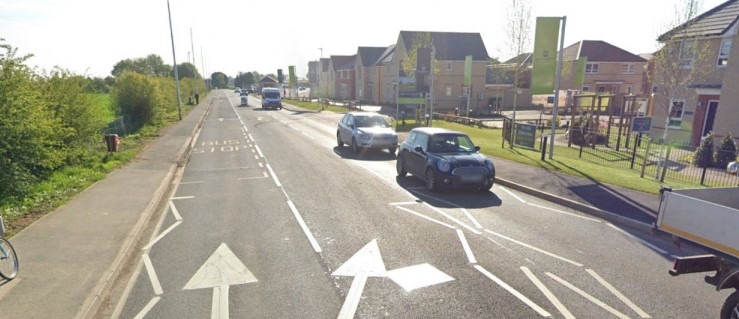 Looking east along Eastrea Road with the application site frontage to the left of the picture