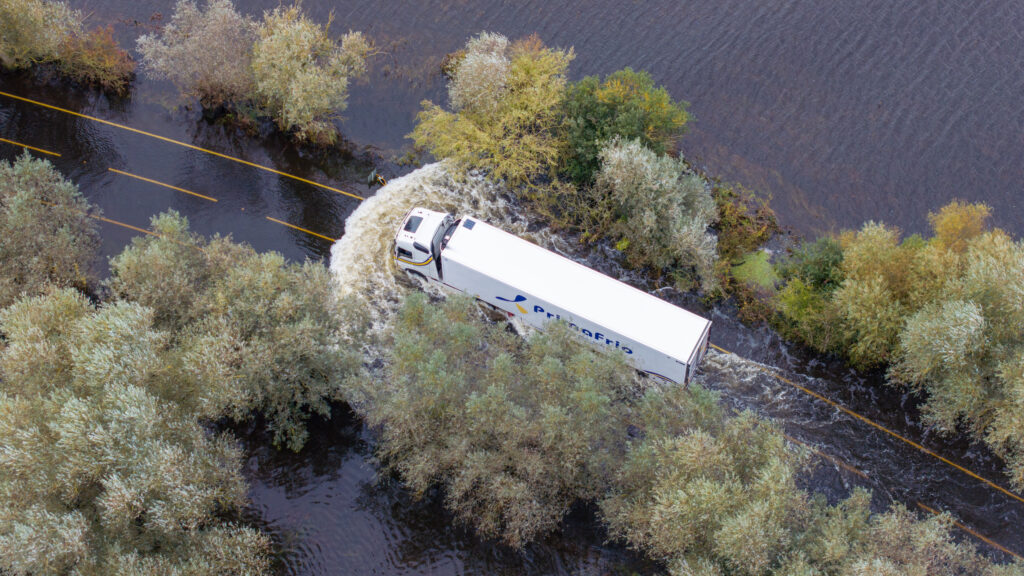 Picture dated October 10th shows the bigger you are, the better the chances of crossing the flooded A1101 in Welney on the Norfolk/Cambs border. PHOTO: Bav Media 