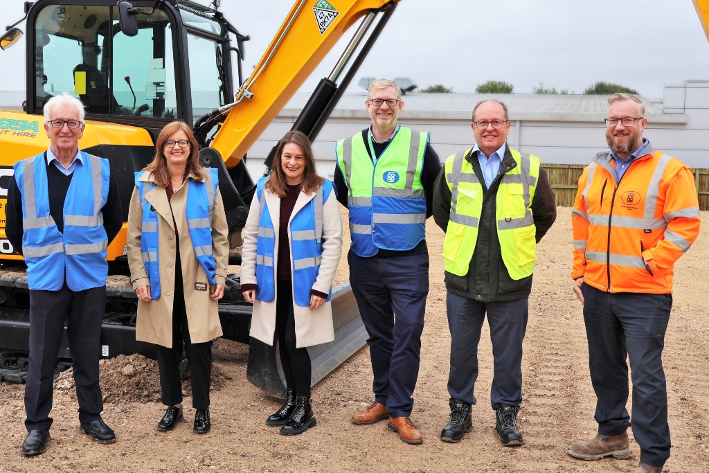 •Lincolnshire Co-op colleagues, including Steve Leach (third from right, quoted) with Millard Maher Construction team members, including David Millard (far left, quoted), pictured at another site