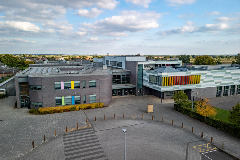 Neale Wade Academy, March, Cambridgeshire. An email sent out to parents of students at the Neale-Wade Academy and seen by CambsNews says unless ‘specific detail’ about illness is provided, the school will record such absences as unauthorised. Inset: Graham Horn, principal