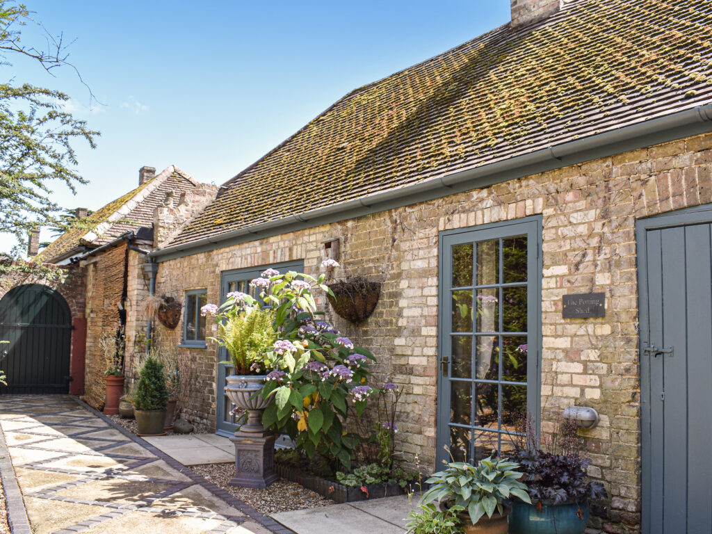 The Potting Shed offers an idyllic backdrop for a countryside escape but with the bustling historic city of Cambridge only a 30-minute drive away. This barn conversion is sat within the grounds of Grade II* Listed Island Hall, on the edge of the River Great Ouse