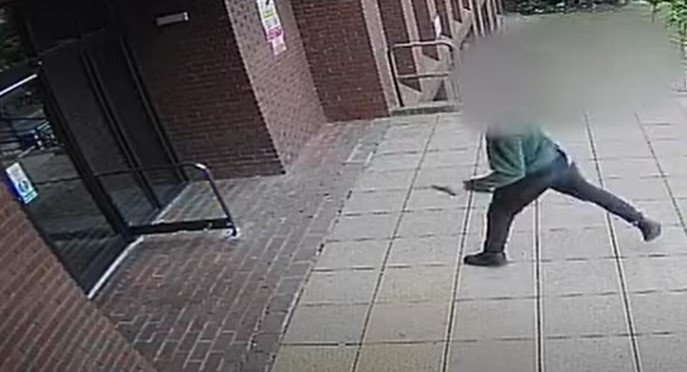 On 10 July Mohammed Fatah was caught on CCTV walking up to the entrance and throwing pots of eggs, mayonnaise, and bread at the door. Image: Cambs Police YouTube 