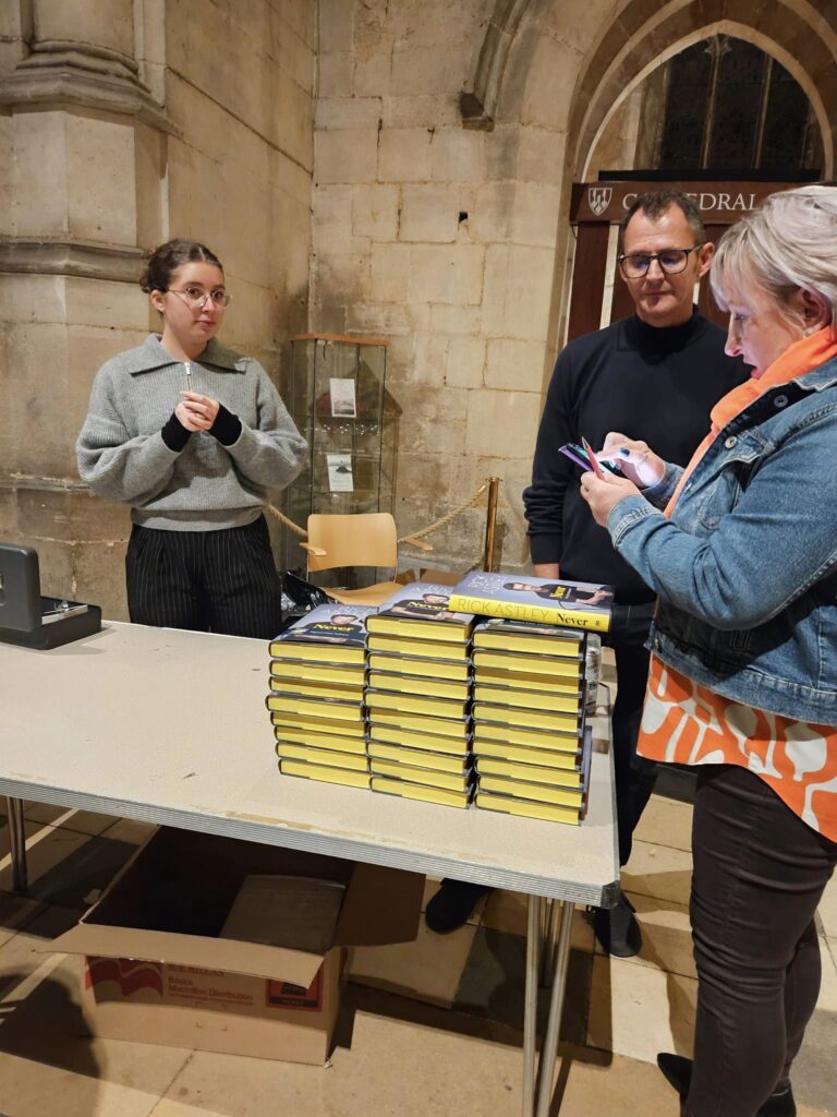 Rick Astley book signing and talk at Ely Cathedral organised by Topping and Co booksellers. Photos: Nicky Still, local published and concert mobile phone photographer.