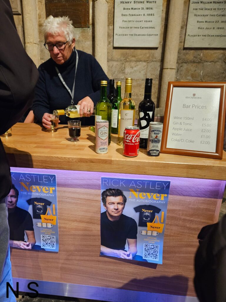 Rick Astley book signing and talk at Ely Cathedral organised by Topping and Co booksellers. Photos: Nicky Still, local published and concert mobile phone photographer.