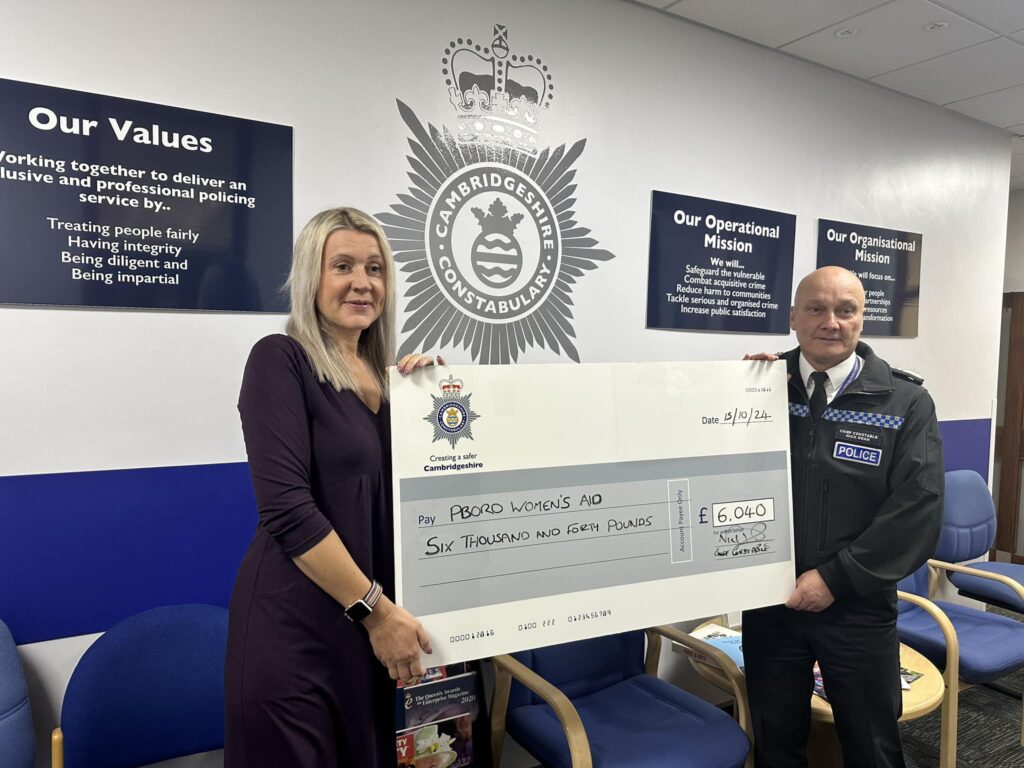 Nick Dean the Chief Constable hands over cheque to Peterborough Women’s Aid