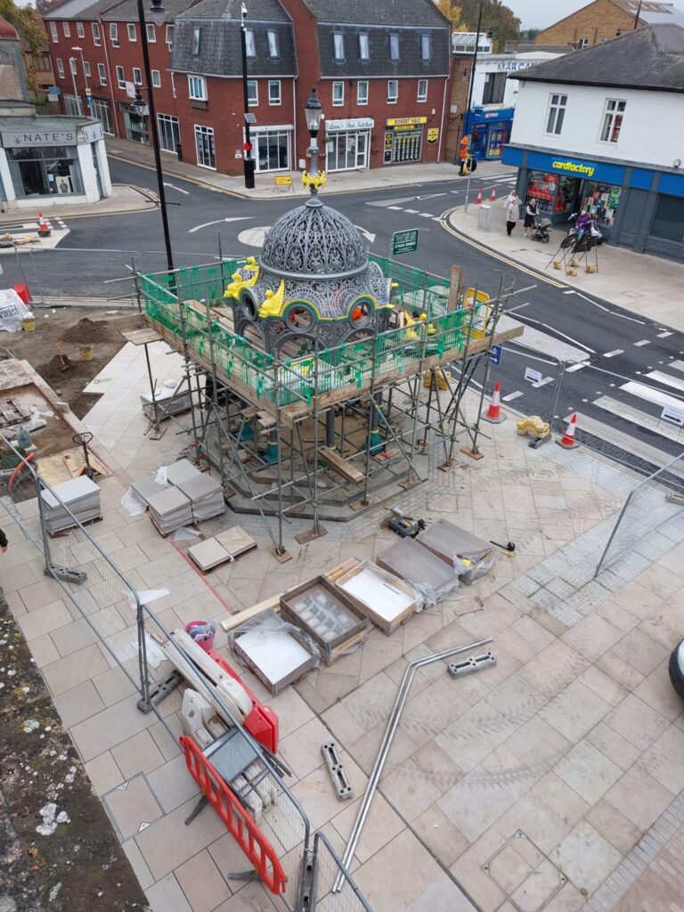 Historic fountain gets a controversial new ‘home’ outside Fenland shop