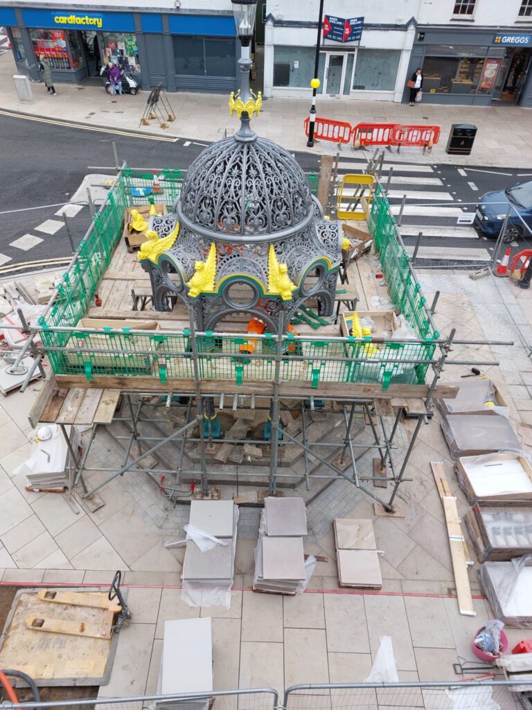 Historic fountain gets a controversial new ‘home’ outside Fenland shop