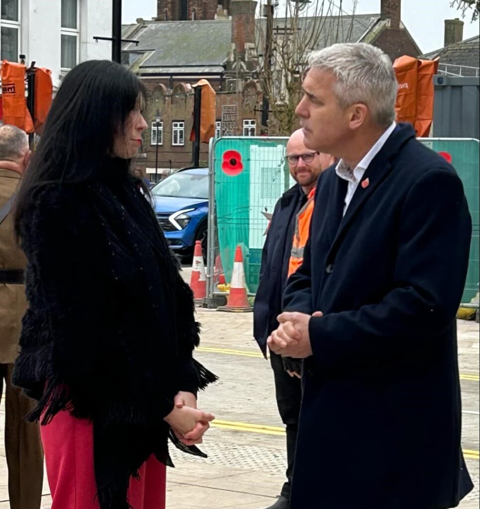 MP Steve Barclay grabs a word with March town councillor Hannah Orbell 