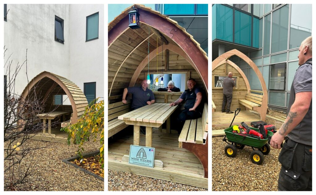 Jennie Grainger – Lead Volunteer Gardener and Staff Reflection Garden designer – with some of the Wood Wizards team installing the pods at Peterborough City Hospital