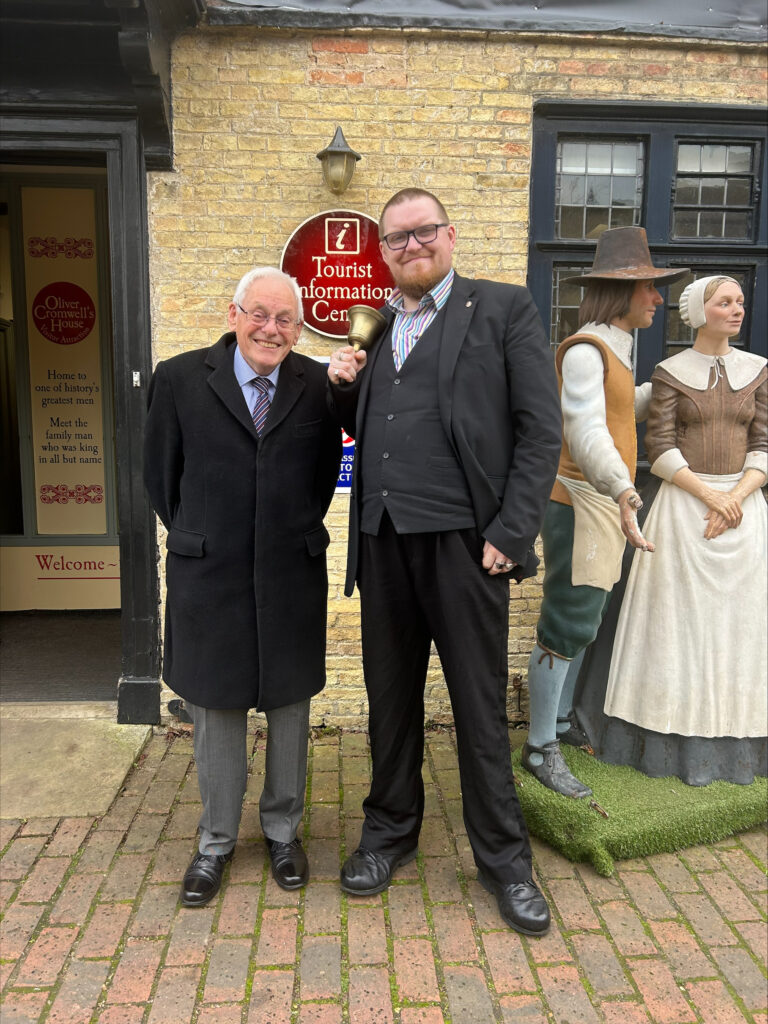 Mayor Cllr Chris Phillips stands with Matthew Routledge, Town Crier of Ely, outside of Oliver Cromwell’s House, Ely, Cambridgeshire 