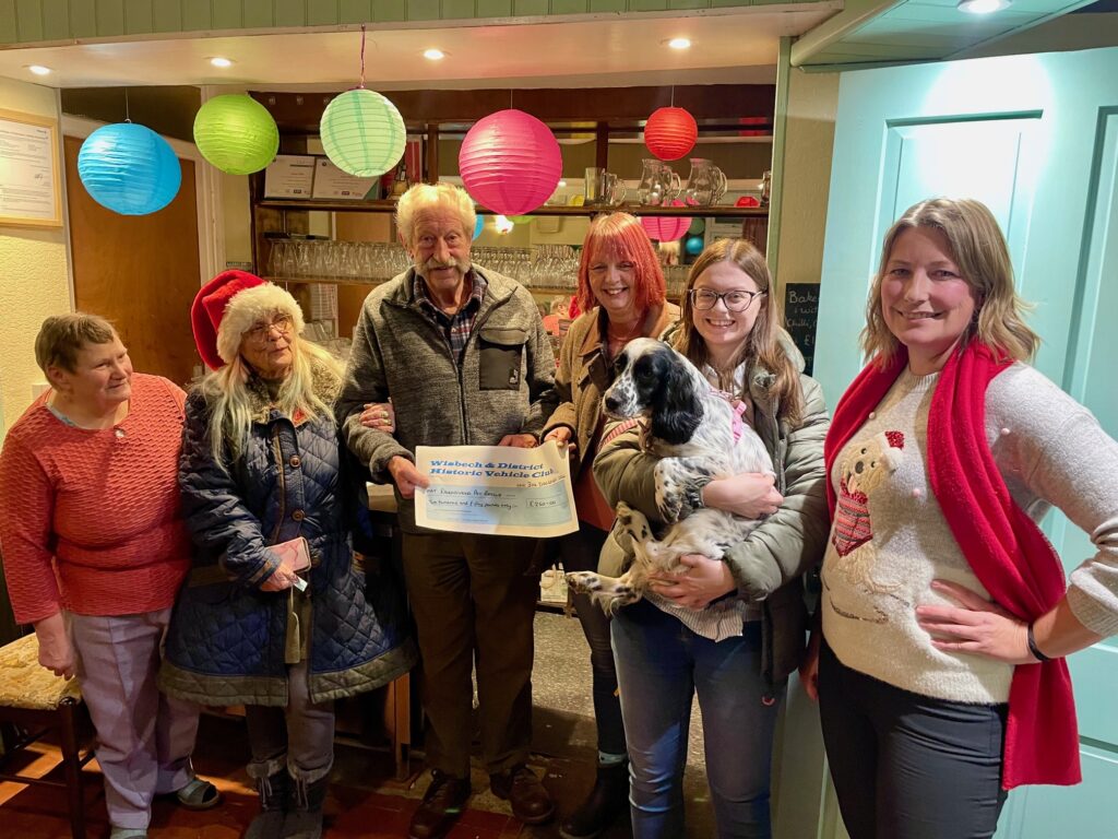 Julie Judy and Charlie from Ravenswood Pet Rescue receive their cheque from Club President Fred Clarke, with Club Chairman Sara Fleming and Vice-Chair Janice Willis.