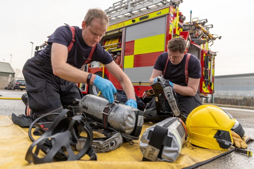 Assistant director of Cambridgeshire Fire and Rescue, Wayne Swales spoke to CambsNews on Monday at Huntingdon Fire Station where he oversaw the roll out of what has been described as a “new concept” fire appliance. Cambs Fire also explained why they are asking for a Council Tax increase. Pictured Fire Fighters Ross Turner and Daniel Fielding. Huntingdon Fire Station showcase new concept fire appliance. PHOTO: Terry Harris