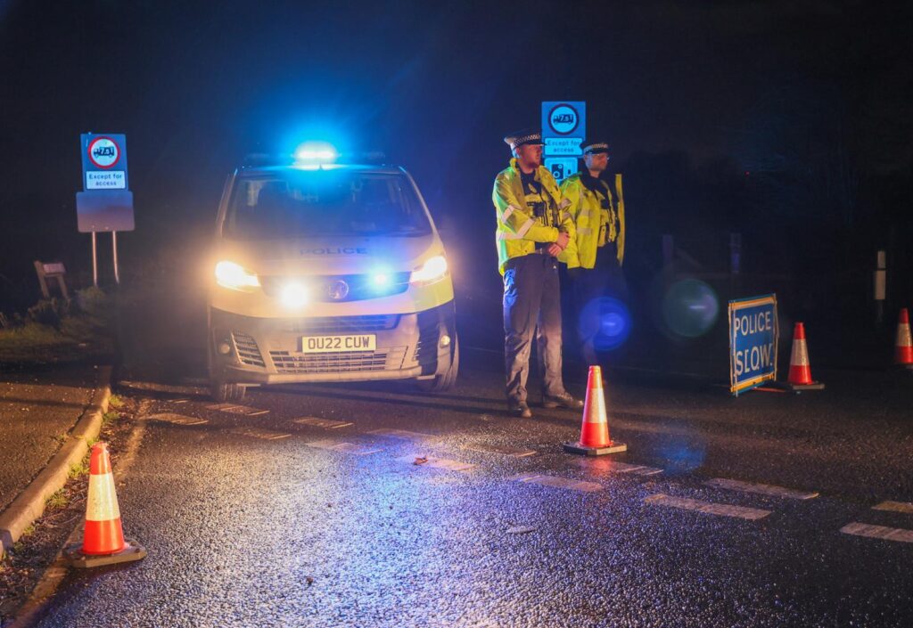 News for Peterborough and Cambridgeshire - Police block the North Bank, Whittlesey, tonight as they conduct a search for a missing man. PHOTO: Terry Harris