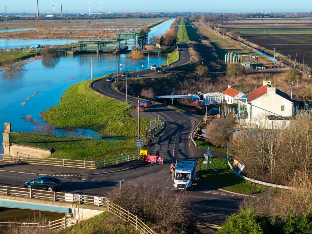 Fed up motorists are using local knowledge – some say commonsense – to continue to use the North Bank road near Whittlesey despite closure measures put in place because of flooding. PHOTO: CambsNews